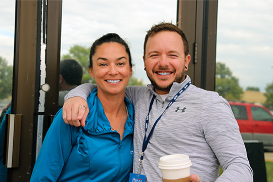 Team members working together in a positive, collaborative environment that reflects Thryv’s culture of growth, recognition, and shared success.