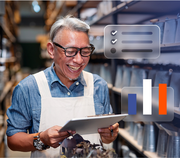 Small business owner reviewing inventory tracking template on tablet