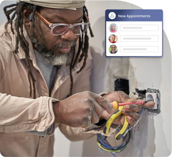 Electrician working on the electrical outlet
