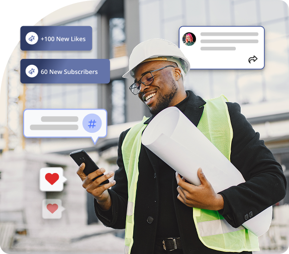 A contract worker looking at his phone smiling