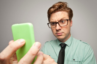 Is Your Site Mobile Friendly - Man Looking at Phone