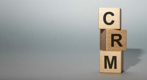 A block of letters spelling out CRM